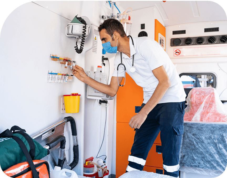 Healthcare worker using first aid and emergency supplies