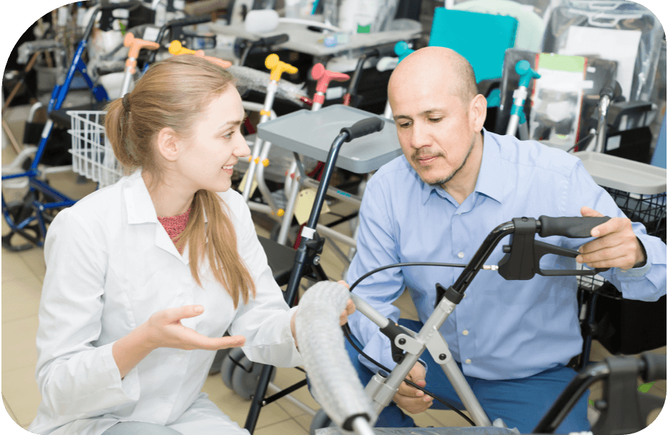 Woman helping man with medical equipment rental and loan