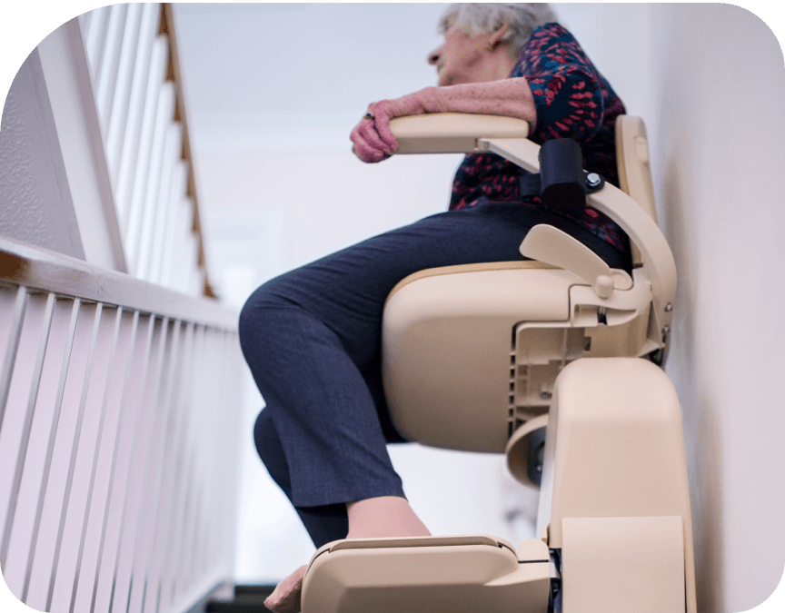 Woman on stair lift